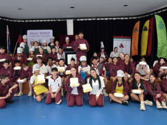 The students pose for a commemorative photo