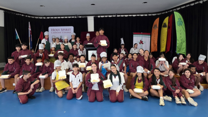 The students pose for a commemorative photo